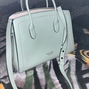 kate spade mint green satchel with structured design and textured leather